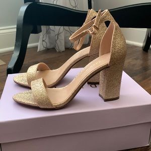 Gold high heels